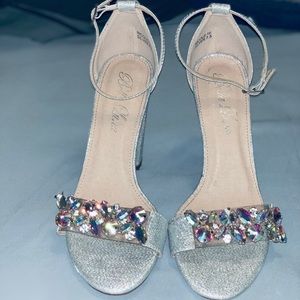 Bella Luna silver shoes with rhinestones.
